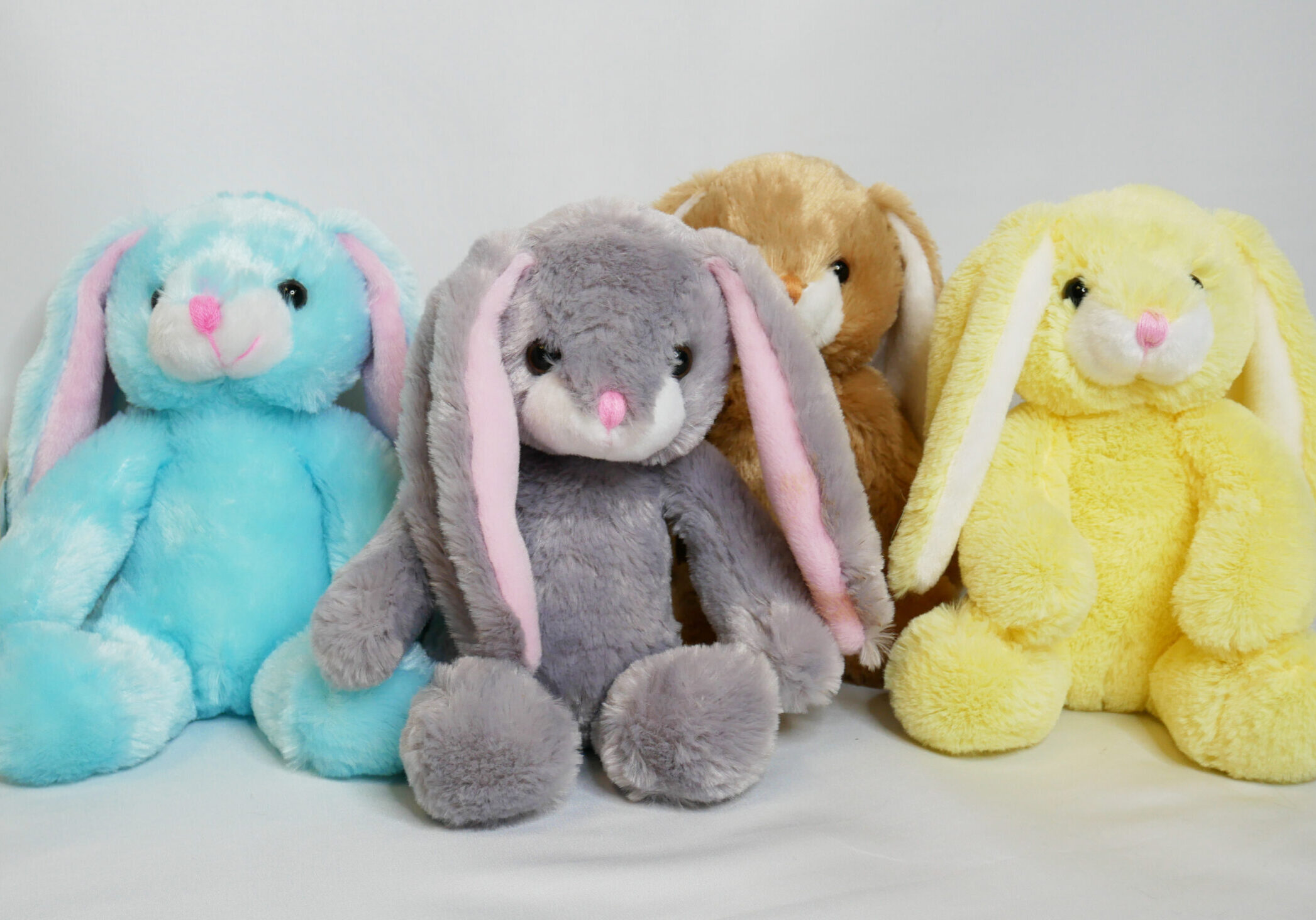 Custom Plush Back-end Freemiums - Fundraising Gift Ideas for Non-Profits, Businesses, and Corporations. All wholesale Back-end Freemium bunnies are custom made to fit the client's branding needs.